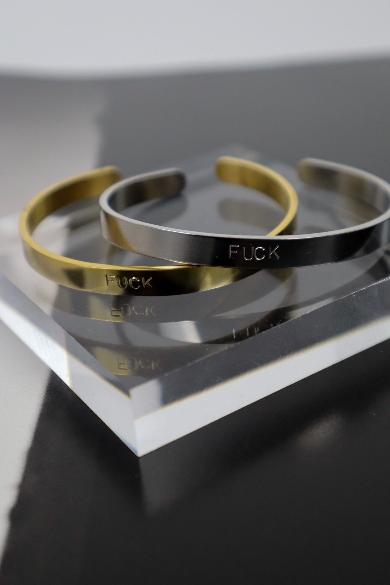 THE WORD WATER RESISTANT CUFF - SILVER/GOLD